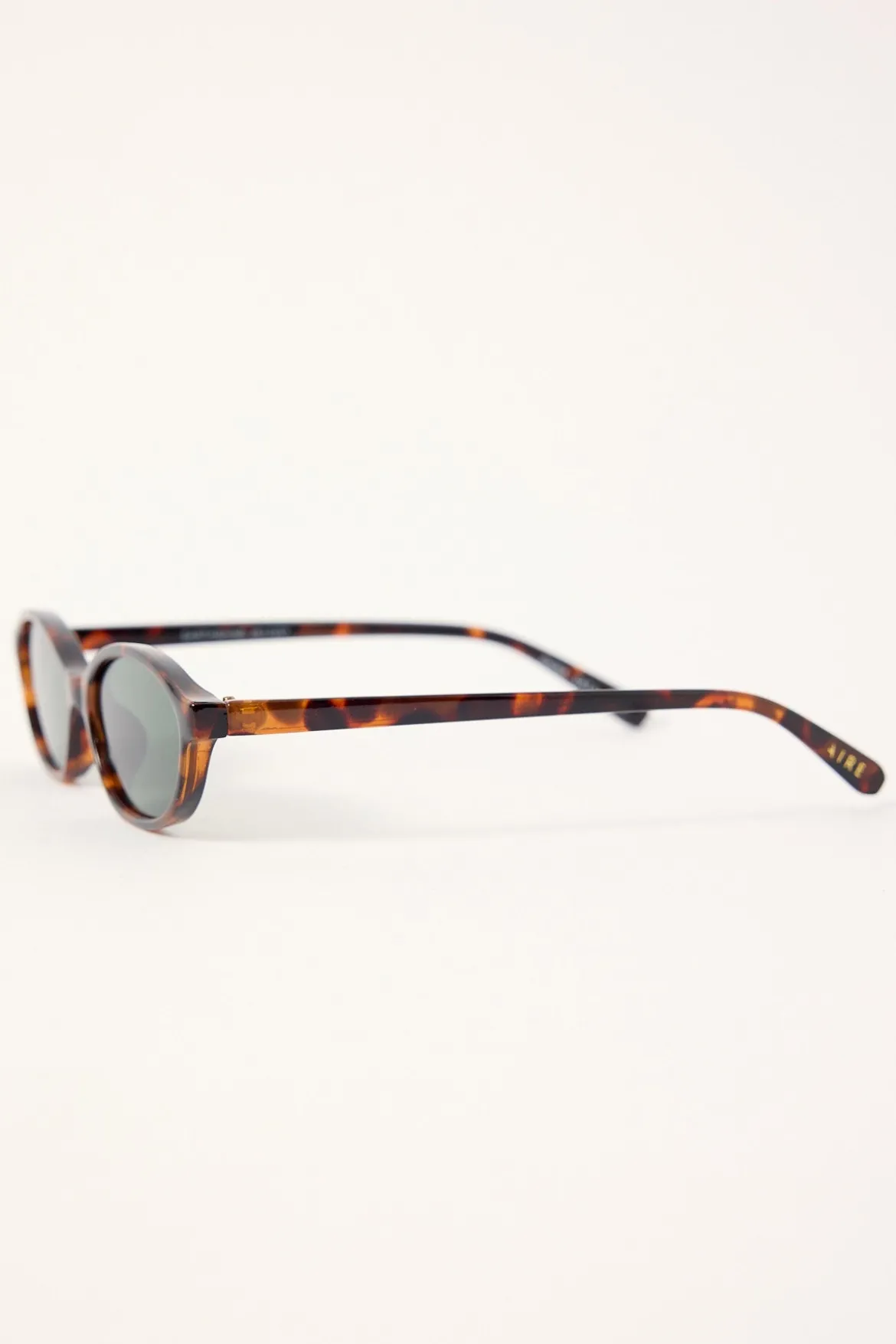 Earthshine Dark Tort/Green Mono